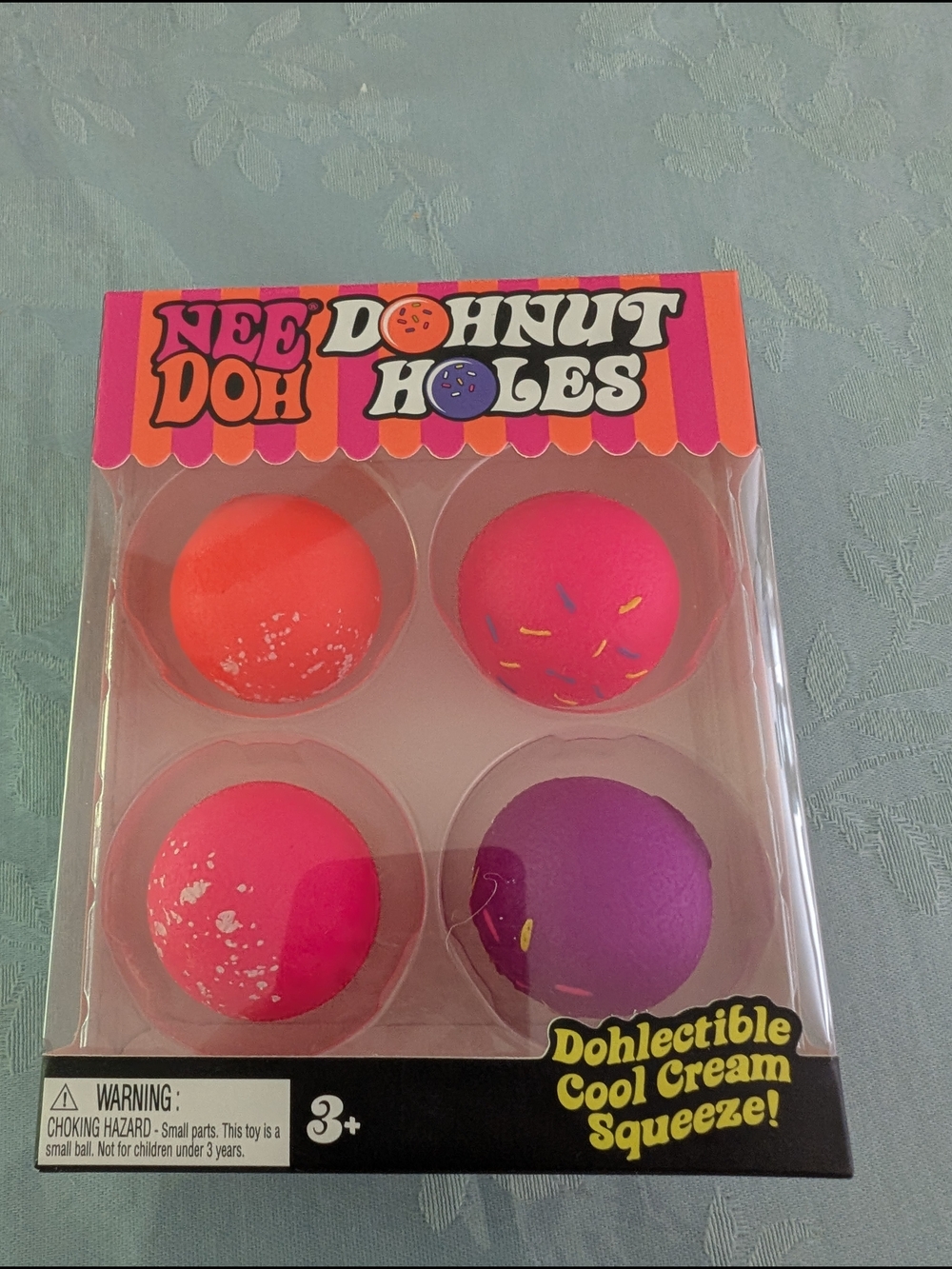 NEE DOH Donut Hole Squeeze Toy - Bright Pink & Purple